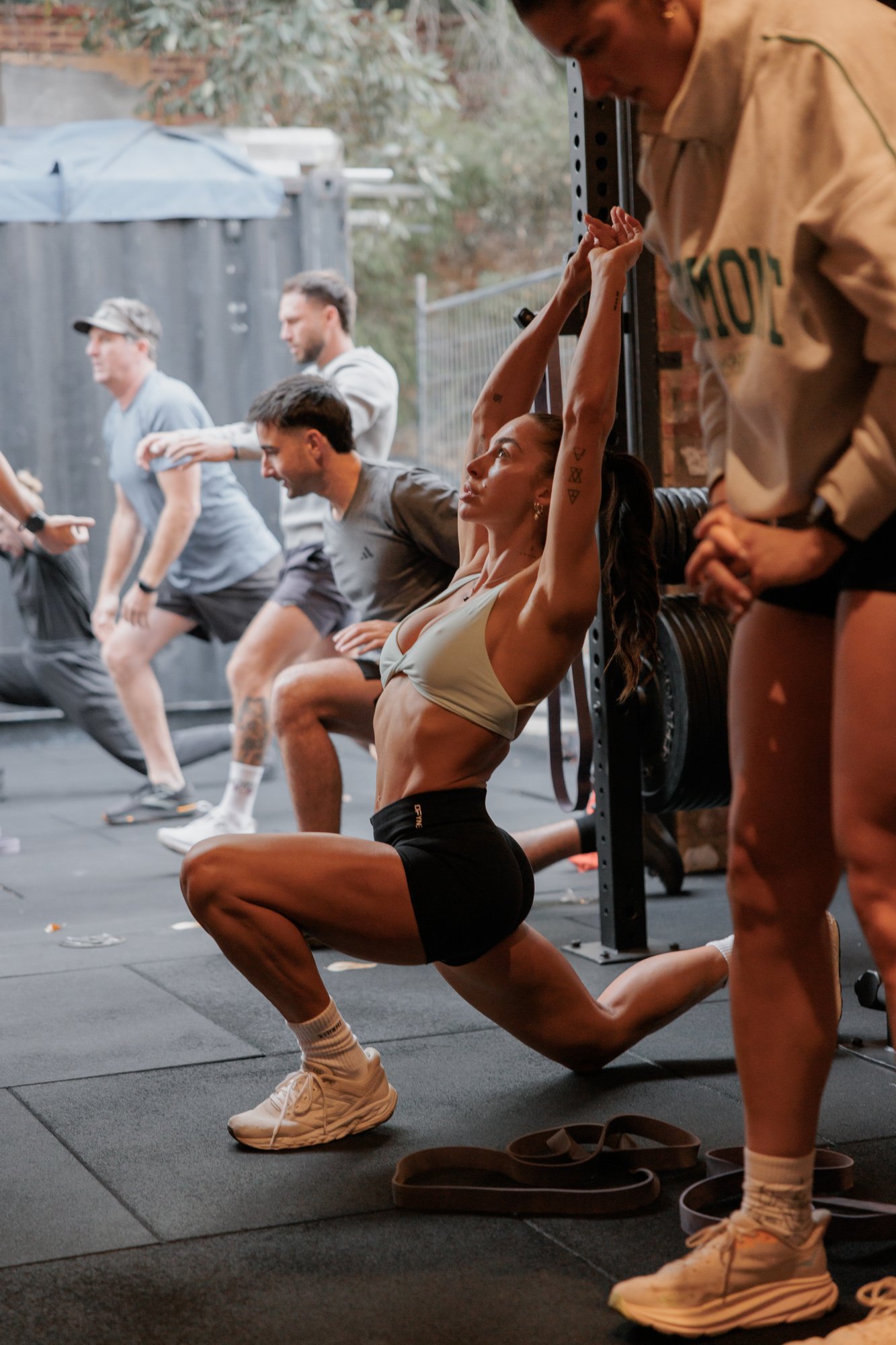 Bsweat member stretching after training
